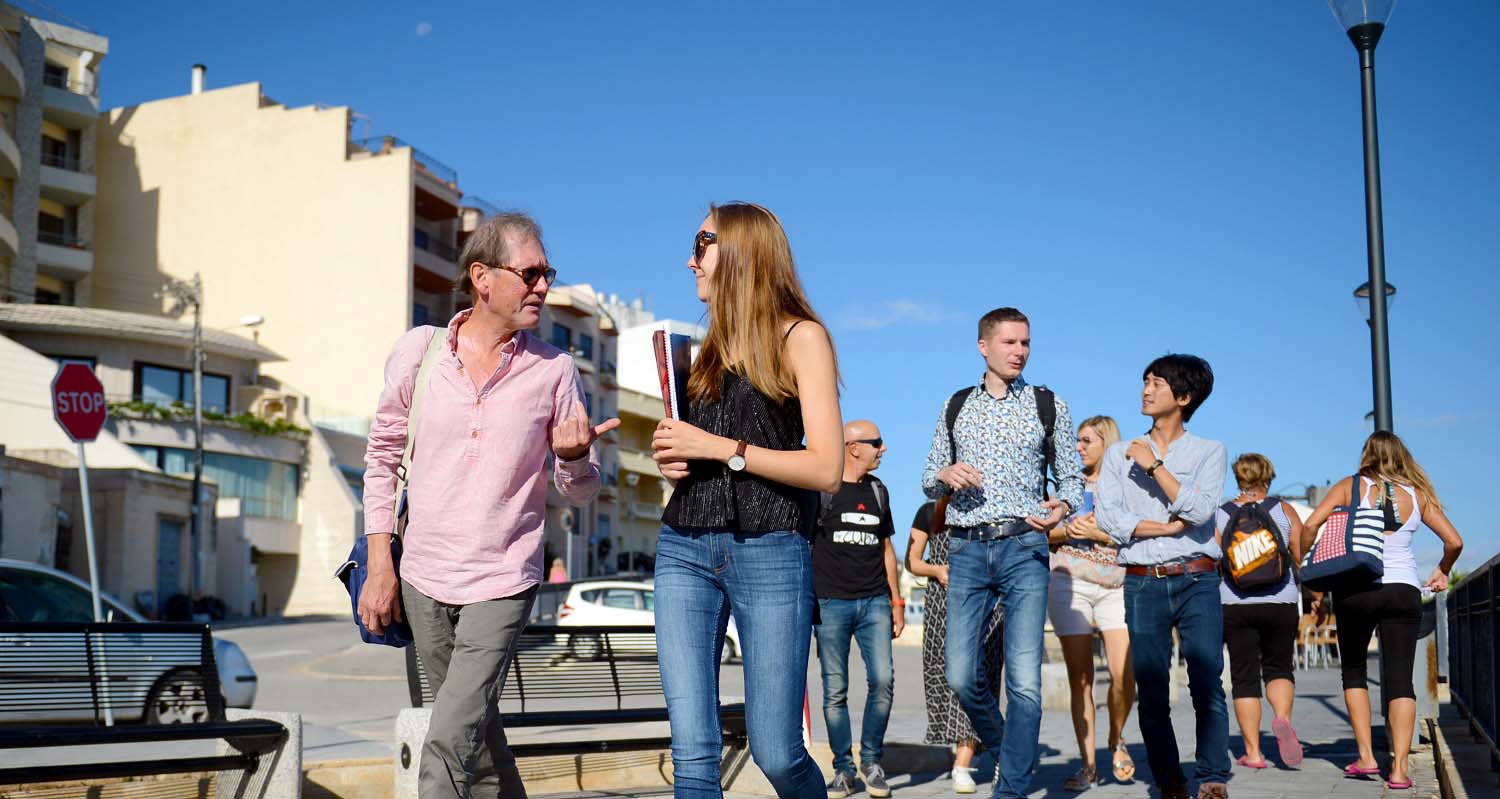 Students walking to their hotel after school