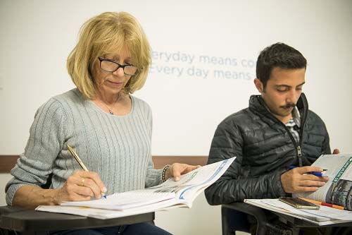 Two students working during their lessons