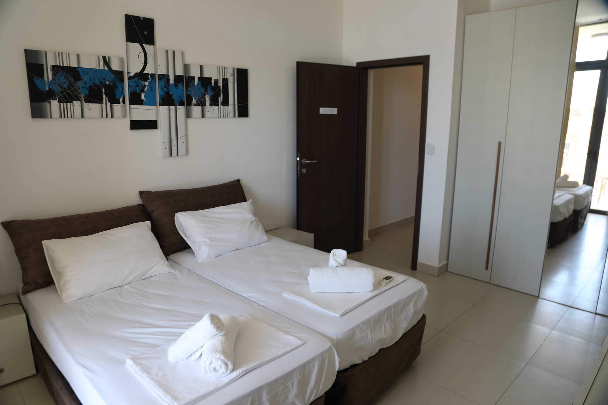 A bedroom at BELS Gozo superior residence