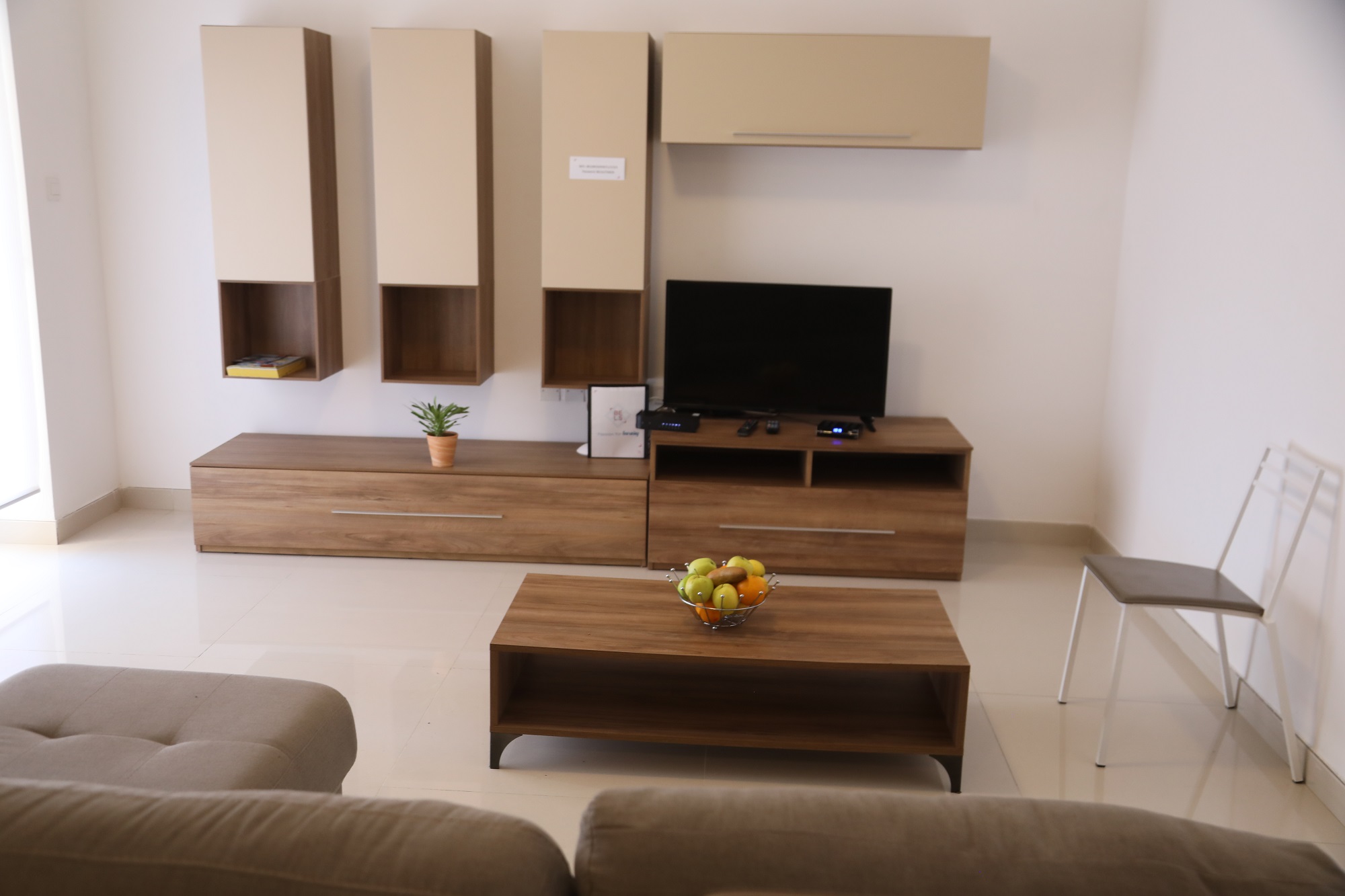 A photo showing the tv and living room in our BELS Malta superior residences